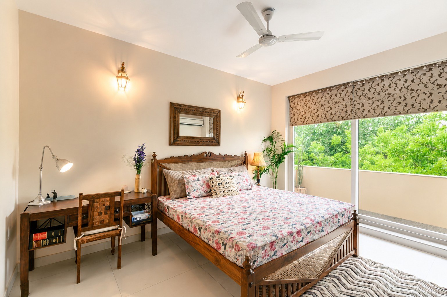 Bedroom with a large window, greenery, and ceiling fan.